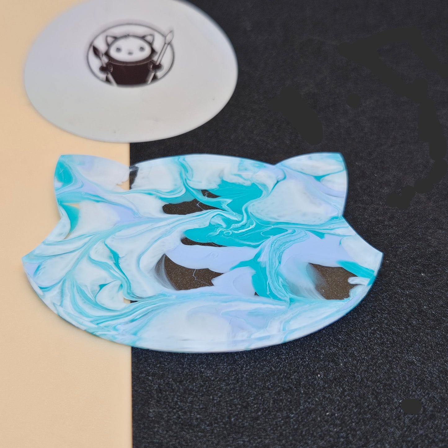 Blue Sky Tides Acrylic Swatch on a black and beige background
