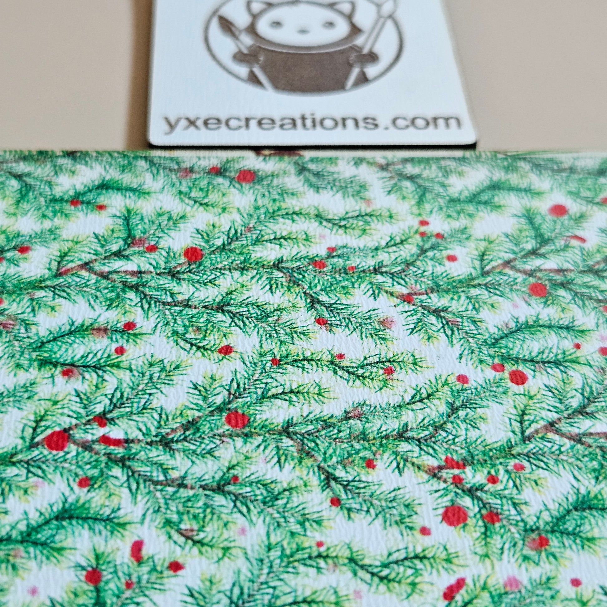 Next Level Sheet Acrylic with green leaf pattern and red berries, branded 'yxecreations.com'.
