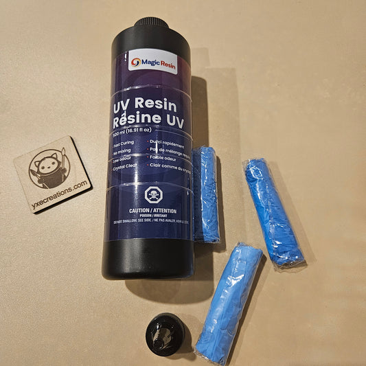 UV Resin UV bottle with blue gloves on a beige surface - UV Resin - 500 ML Kit