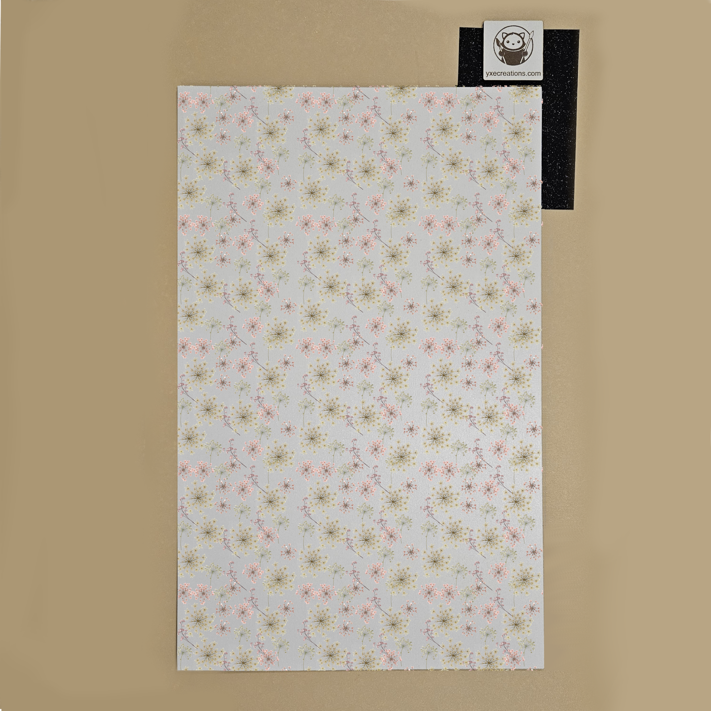 Floral patterned sheet for laser cutting with Wildflower Garden Preview on a beige background with a brand label Next Level Sheet.