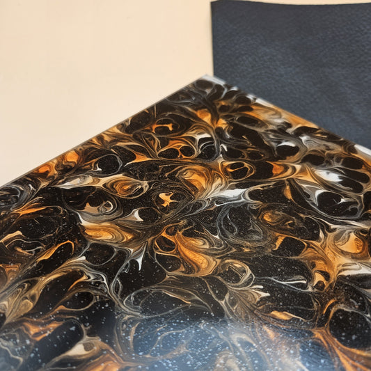 Amber and Black Tides acrylic sheet, angled close-up
