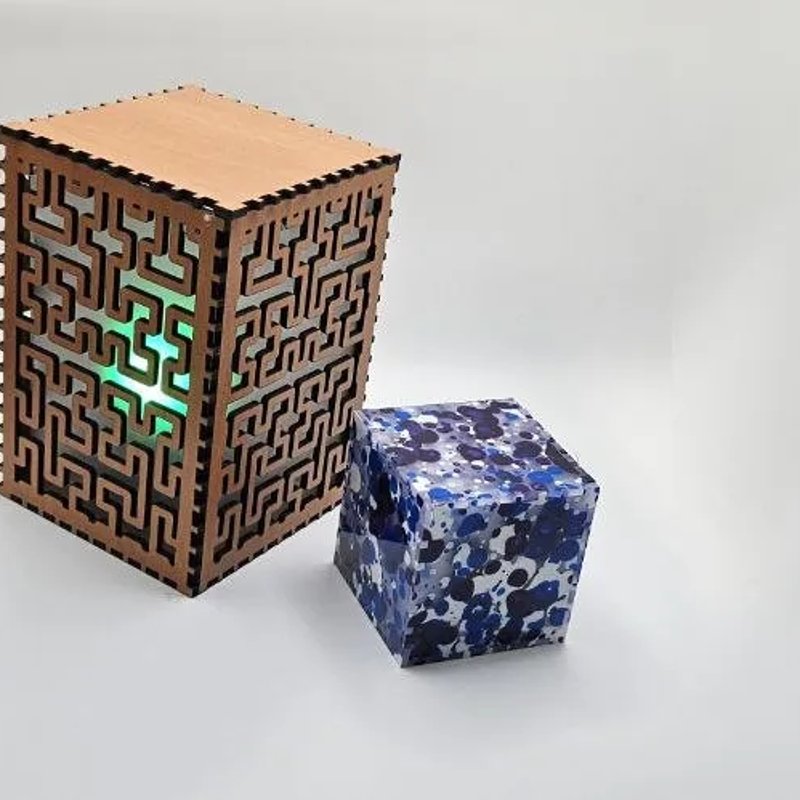 Laser-cut finger-joint boxes made with the MyLaserTools box generator