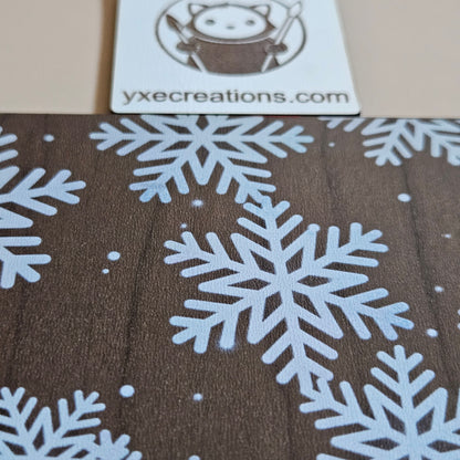 Brown Next Level Sheet Acrylic with white snowflake pattern and VYCE Creations logo.