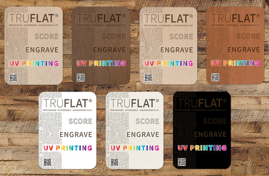 Set of TRUFLAT card samples on a wooden background